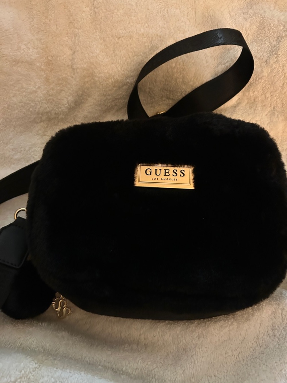 GUESS Black Faux Fur Crossbody  with Gold Plaque